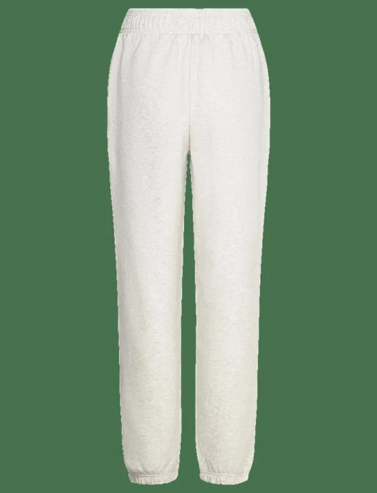 Kvinnor New Balance Mjukisbyxor|Sport Essentials Fleece Jogger - Sweatpants
