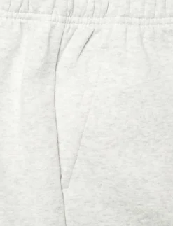 Kvinnor New Balance Mjukisbyxor|Sport Essentials Fleece Jogger - Sweatpants