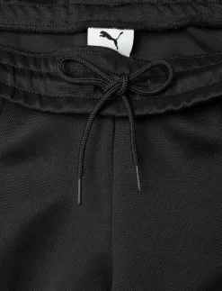 Kvinnor PUMA Byxor|Mjukisbyxor|T7 Low Rise Track Pants op - Sweatpants