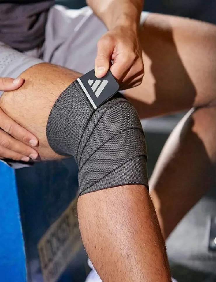 adidas Equipment Universal Support Wrap - Long - Knästöd|Kvinnor Sportutrustning|Sportutrustning