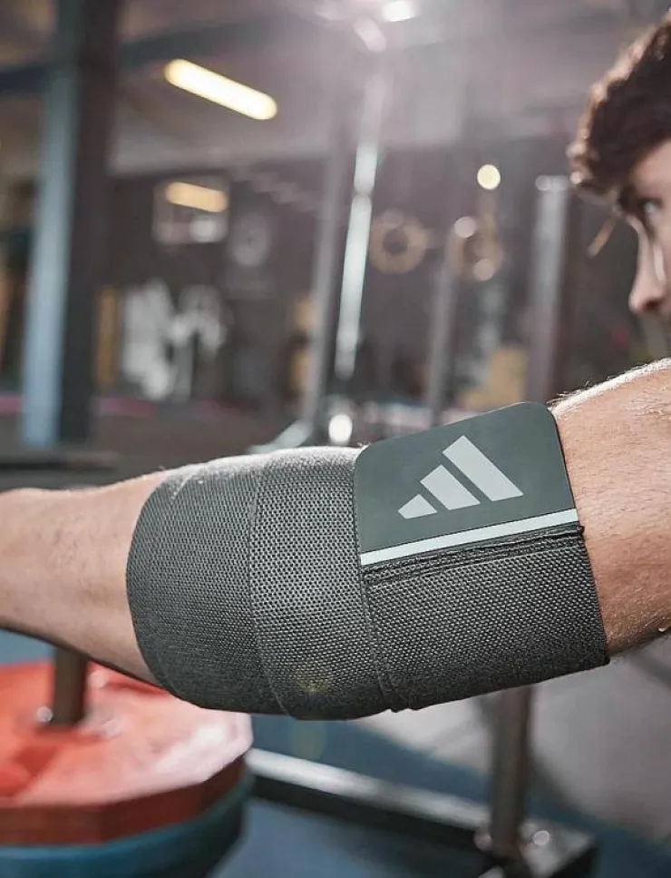 adidas Equipment Universal Support Wrap - Long - Knästöd|Kvinnor Sportutrustning|Sportutrustning